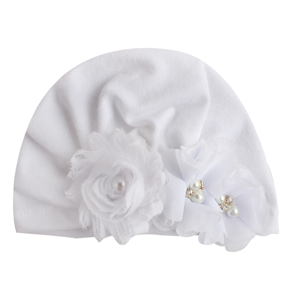 Babymütze mit Sonnenblumen