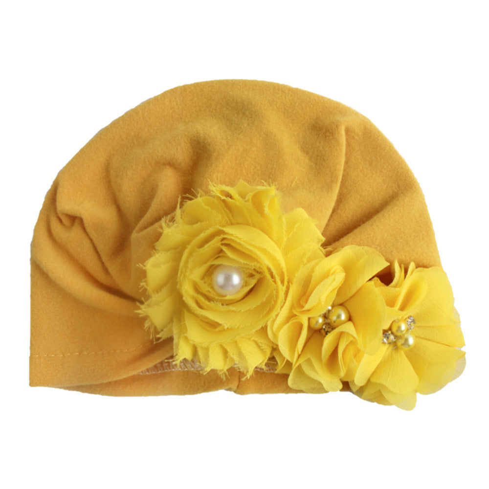 Babymütze mit Sonnenblumen